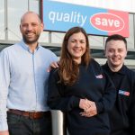 Managing Director of Quality Save Ric Rudkin with two employees outside the Walkden store